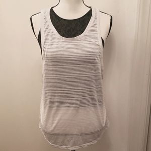 Womens tank top two in one. Bought and never wore them.